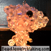 Pink big head bear side view